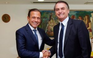 Read more about the article Bolsonaro e Doria fazem flexão de braço durante assinatura de termo em Centro Paraolímpico